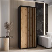 1,1 meter brede schuifdeurkast Mina in wit/eiken, metalen handgrepen in zwart, front van gelamineerd hout, lamellen in zwarte look