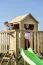 Speeltoren S4A incl. golfglijbaan, dubbele schommel aanbouw, balkon, zandbak, klimwand en houten ladder - Afmetingen: 450 x 330 cm (B x D)