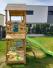Spielturm inkl. Wellenrutsche aus Holz Natur Seitenansicht 